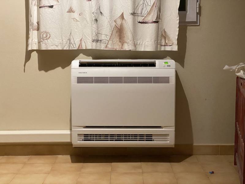 Installation d'une console de climatisation double flux Heiwa à Bouc bel air